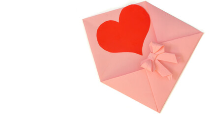 Open pink envelope made of origami paper.