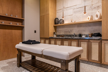 Fototapeta na wymiar Interior of an empty modern spa massage room.