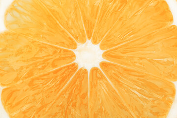 Orange citrus fruit slice macro closeup background texture