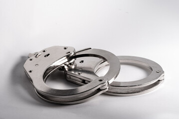 Police handcuffs. A measure of direct coercion. A tool used by the police to limit the freedom and...