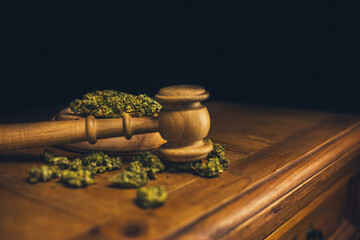 Legality of Medical Cannabis, legal and illegal Cannabis, on the World - Wooden judge hammer and...