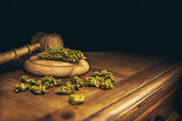 Legality of Medical Cannabis, legal and illegal Cannabis, on the World - Wooden judge hammer and...