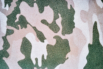 Military dusty-white-green fabric camoflauge texture pattern.