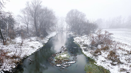River in fog in winter