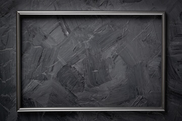 Metal frame on gray grunge textured background