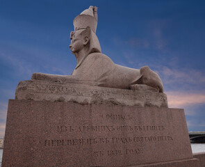 Ancient Egyptian sphinx on Universitetskaya embankment of Neva river in front of Imperial Academy of Arts, Saint Petersburg, Russia