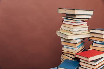 educational books for training in the college library on a brown background