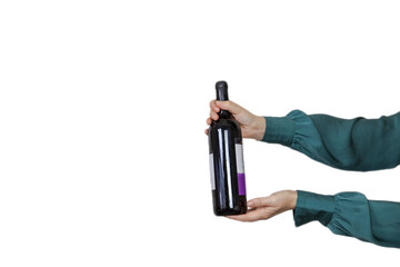 Female holding bottle of expensive red wine isolated on white background, giving gift, party,...