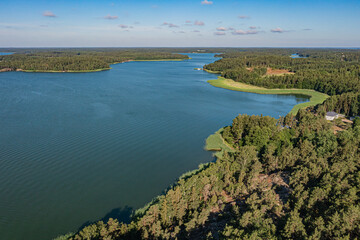 Photo from a drone, on a sunny summer day, a view of the islands in the sea. Finland, Turku. Nature and landscape of Scandinavia