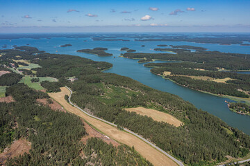 Fototapeta na wymiar Photo from a drone, on a sunny summer day, a view of the islands in the sea. Finland, Turku. Nature and landscape of Scandinavia