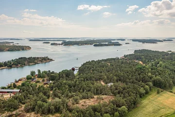 Foto op Canvas Photo from a drone, on a sunny summer day, a view of the islands in the sea. Finland, Turku. Nature and landscape of Scandinavia © M.V.schiuma