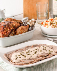 vitel tone with potatoes and vegetables