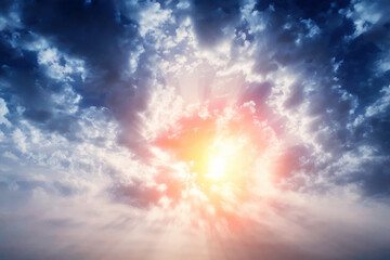 Beam of light through the clouds. Rays of light shining through clouds. Ultraviolet rays concept....