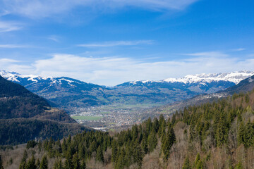 The valley and town of Passy in the Mont Blanc massif in Europe, France, the Alps, towards Chamonix, in spring, on a sunny day.