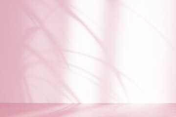 Pacific Pink abstract background with tropical plant shadows. Minimal creative concept. Copy space.