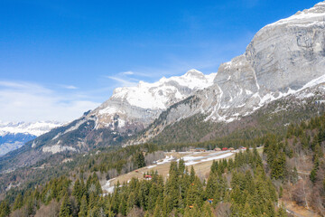 The Pointe de Plate in the forest in the Mont Blanc massif in Europe, France, the Alps, towards Chamonix, in spring, on a sunny day.