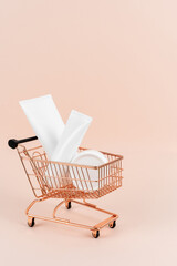 Shopping cart with pampering lotion and moisturizing cream © brizmaker