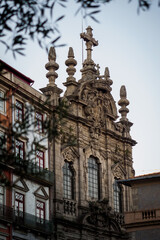 Fototapeta na wymiar Sunset over the Church of Mercy flower street in Porto