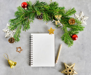 Top view flat lay christmas mockup with stack of notebooks and pencil. Wish list, holidays concept. Text space