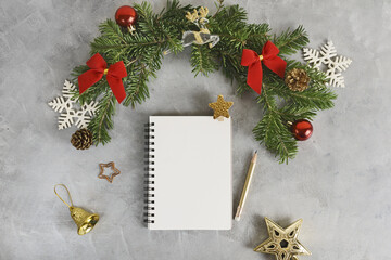 Top view flat lay christmas mockup with stack of notebooks and pencil. Wish list, holidays concept. Text space