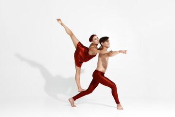 Couple dancing ballet isolated on white background