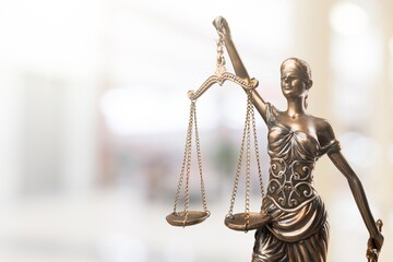 Statue of justice on a background, law concept