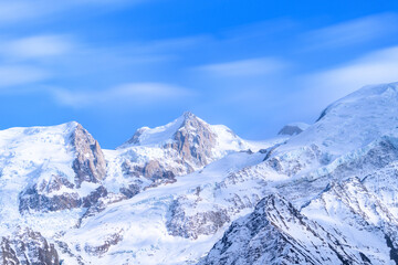 Fototapeta na wymiar The panoramic view of Mont Maudit in the Mont Blanc massif in Europe, France, the Alps, towards Chamonix, in spring, on a sunny day.
