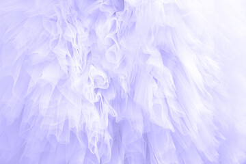Fototapeta premium Trendy Color of Year 2022. Violet texture of a wavy surface of a chiffon fabric