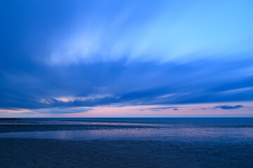 Clouds moving over the Channel Sea in Europe, France, Normandy, towards Ouistreham, in summer.
