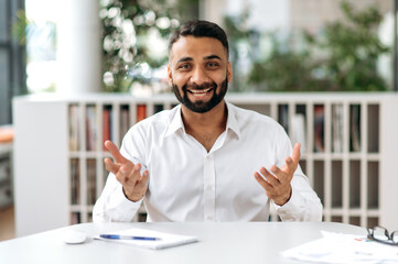 Portrait confident joyful sociable young adult Indian businessman, top manager, financial...