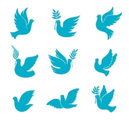 Fototapeta na wymiar Christmas dove silhouettes of isolated vector blue pigeon birds with olive and palm tree branches. Dove of peace, Christian religion symbols of faith, hope and love, Xmas tree decoration design
