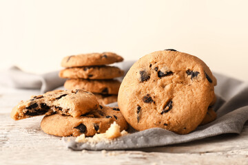 Tasty homemade cookies with chocolate chips on table, closeup
