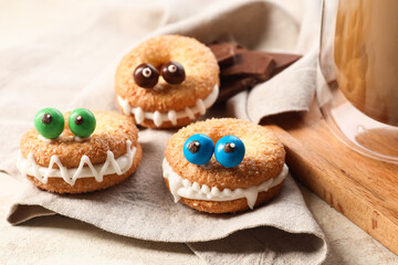 Funny cookies for Halloween on table