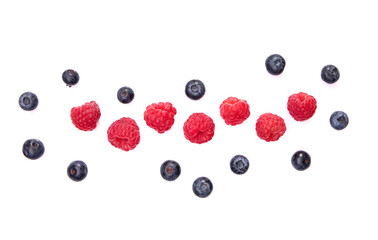 Tasty ripe berries on white background