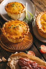 Tasty beef pot pies on table © Pixel-Shot