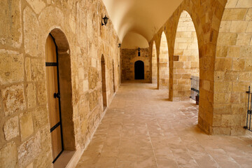 Rooms along a corridor with arches at Deyrulzafaran Monastery, Mardin, Eastern Anatolia, Turkey
