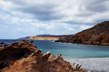 Fototapeta na wymiar Beautiful wild landscape: seashore with rocks and clear water