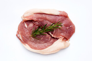 Pork meat with rosemary on white background.