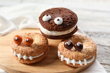 Funny cookies for Halloween on table