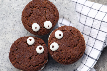 Funny cookies for Halloween on table