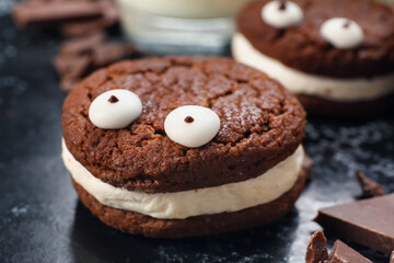 Funny cookie for Halloween on table, closeup