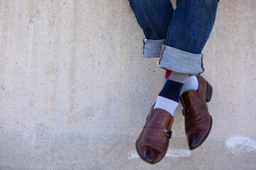 Photo of men's fancy socks and dress shoes. 