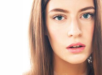 Obraz premium beautiful young brunette woman with vitiligo disease close up isolated on white