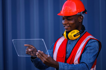 African male engineer holds a clear plastic like a tablet for added Infographic.