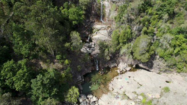 Cascatas de Fecha de Barjas or Tahiti waterfalls in Peneda-Geres National park, Portugal. Aerial top-down circling