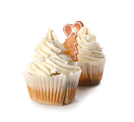 Delicious Christmas cupcakes on white background