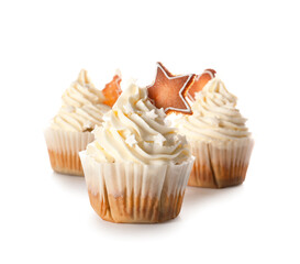 Delicious Christmas cupcakes on white background