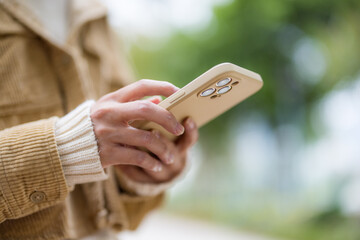 Woman use smart phone at outdoor