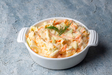 Coleslaw salad close up on a bowl. Cabbage, carrot salad. (Turkish name; lahana salatasi)