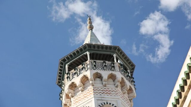 Detail of tall tunisian tower with arabic moorish architecture styles, exterior facade decorated